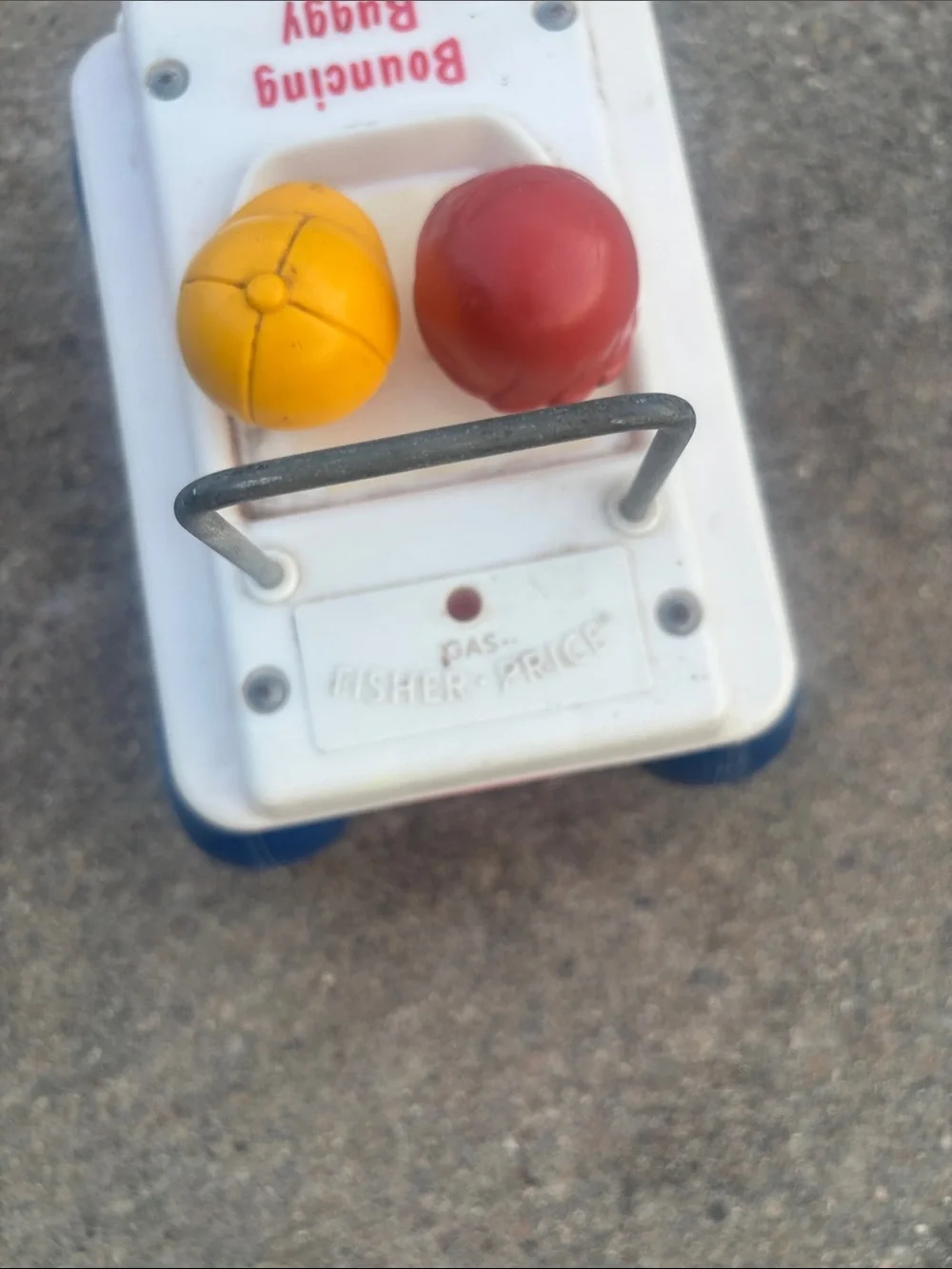 Vintage 1973 Fisher PriceBouncing Buggy Pull Toy - White with Blue & Red Accents